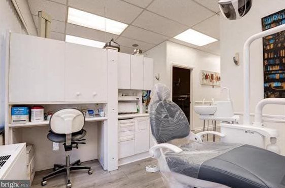 Clinical workstation with clean white cabinetry